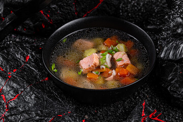 Wall Mural - Fish soup. Salmon perch broth carrot seaweed Kombu dried tuna potato pepper