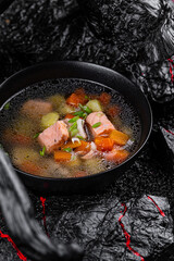 Wall Mural - Fish soup. Salmon perch broth carrot seaweed Kombu dried tuna potato pepper