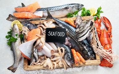 Canvas Print - Fresh fish and seafood arrangement. Healthy eating concept. Top view..