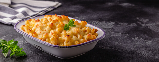 American mac and cheese, macaroni pasta in cheesy sauce