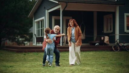 Wall Mural - Granny and Grandpa are Excited to Meet Their Drunk Daughter in Front of the Home. Grandparents Spending the Weekend with Kids, Enjoying Family Time with Grandchild.