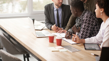 Wall Mural - business team is discussing the plan of a new startup .