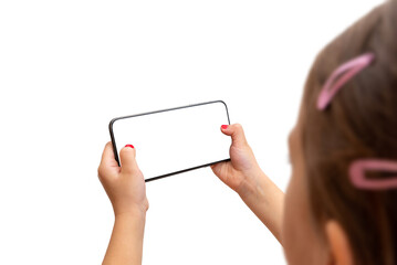 Leinwandbilder - Girl holding smart phone in horizontal position. Isoalted display and background. Playing game or watch video concept