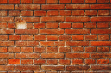 Brickwork Without A Single Brick. Orange Wall. Masonry Work.