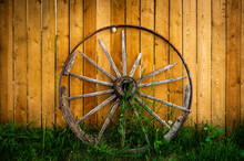 Wagon Wheel On Fence