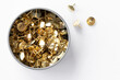 Gold Tack in a Tin Container