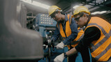 Fototapeta Paryż - Asian workers work in factories.