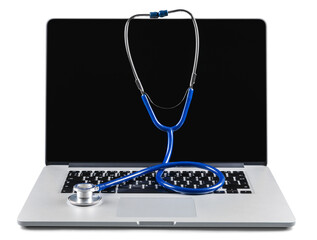 Modern laptop computer with stethoscope on the desk