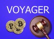 Judge's gavel and crypto coins in front and Voyager Digital Ltd company logo