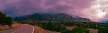 Sunrise Dramatic Cloudscape Panorama Over The Sandia Mountains With Snow Falling In October In Albuquerque, New Mexico, USA