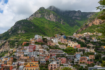 Wall Mural - The picturesque small Italian town of Positano, descending from the terraces from the mountains to the Mediterranean Sea. This is one of the most famous places on the Amalfi Coast.