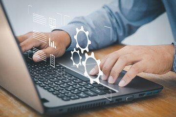 Wall Mural - person working on computer laptop. automation, industrial business process workflow optimisation con