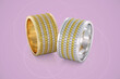 Jewelry wedding bands gold rings with diamonds. 3D rendering on pink background