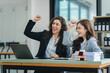 © Daenin - young women working together hands together teamwork Smiling happy and excited at her work.