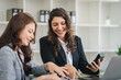 © Daenin - girl working together offer ideas to each other.happy young business colleagues working in the office