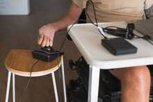 Disabled Man Using Computer, With Special Adaptive Devices