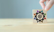 © Parradee - Team building and diversity and common goal concept. Work collaboration for achieving goal and successful business. Productive people skills. Placing wooden cubes with team diversity building icons.