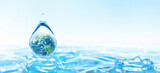 Fototapeta Storczyk - World Water day concept with world in clean water drop on nature green and water ripples design, Environment save and ecology theme concept, Elements of this image furnished by NASA