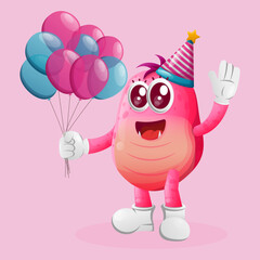 Wall Mural - Cute pink monster wearing a birthday hat, holding balloons