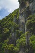 Vertical of scenic mountains with green trees in Khao Sok National Park, Thailand