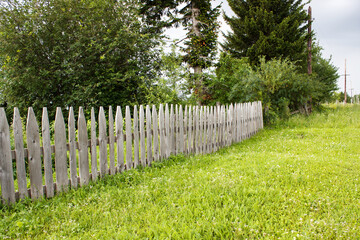 Poster - rural landscape with wooden fence on meadow