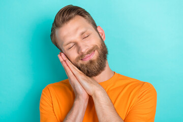 Poster - Photo of sleepy beard guy wear orange t-shirt isolated on teal color backgroiund