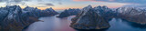 Sunset aerial panoramic view on sharp mountain peaks of Lofoten islands, Norway