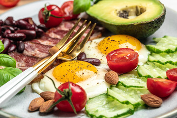 Poster - breakfast diet lunch avocado, fried eggs, bacon, beans and coffee. Food recipe background. Close up