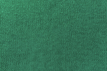 Wall Mural - Knitted green pattern closeup, detailed yarn background.