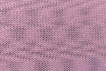 Wall Mural - Knitted pink pattern closeup, detailed yarn background.