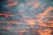 Sunset Sky With Pretty Scattered Orange Tinted Clouds, Full Frame Cloudscape Background