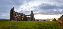 Sunset View Of Whitby Abbey Overlooking The North Sea On The East Cliff Above Whitby In North Yorkshire, England