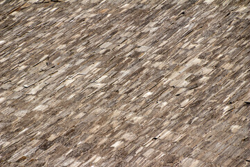 Wall Mural - Full frame abstract texture background of a deteriorating century old barn roof comprised of cedar shake shingles