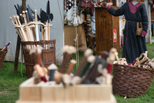 A Stall Selling Wooden Swords At A Medieval Market