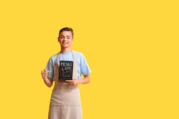 Sticker - Male barista pointing at chalkboard with menu on yellow background