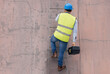 © David L/peopleimages.com - Electrician, engineer and handyman on ladder with tools working on building electricity maintenance. Home renovation, contractor and electrical technician climbing steps with toolbox for installation