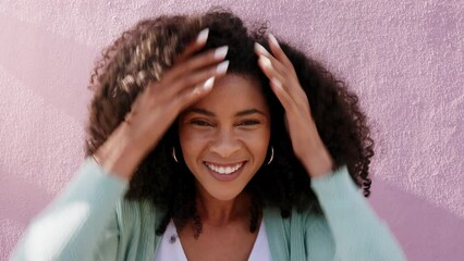 Wall Mural - Beauty, hair care and natural kinky afro with black woman styling curls, proud and happy against a purple wall in an urban city. Portrait of a positive African American feeling proud of hair