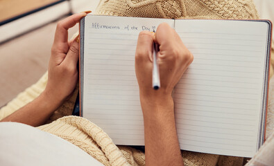 Hands of woman relax, writing in notebook mockup for morning routine on living room sofa. Affirmations, personal goals and book of calm life thoughts or young girl creative thinking journal on couch