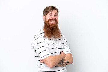 Wall Mural - Redhead man with beard isolated on white background with arms crossed and looking forward