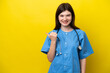 © luismolinero - Young surgeon doctor Russian woman isolated on yellow background pointing to the side to present a product