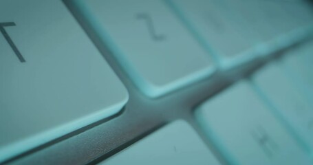 Wall Mural - extreme close-up tracking shot over individual keys of technical computer keyboard