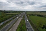 Fototapeta Tęcza - junction of the M25 motorway with the M1 motorway UK drone aerial view