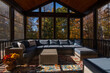 Cozy screened porch enclosure with contemporary furniture at Thanksgiving Holiday. Flower bouquet in a vase, autumn leaves and woods in the background.