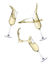Glasses Of Champagne With Splashes Isolated On White Background 