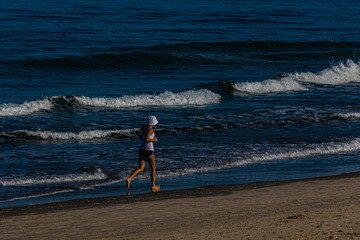 Poster - girl running on the beach