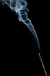 Smoke on dark background from smoldering burning cone incense. Indian scented burning wooden stick for aromatherapy, meditation or room fragrance. Incense Smoke. Overlay layer