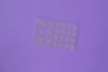 transparent acne patches on purple