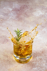 Wall Mural - Glass of whiskey on vintage background