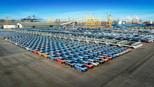 Aerial View A Lot Of New Car For Import And Export Shipping By Ship , Smart Dealership At Car Depot