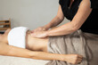 © OceanProd - woman massage body shaping massages girl lymphatic drainage in manual massaging belly in center spa